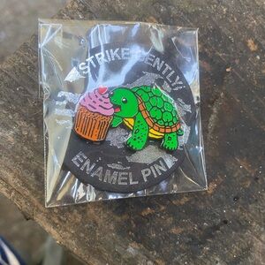 Brand New In Packaging Strike Gently Turtle Eating Cupcake Enamel Pin